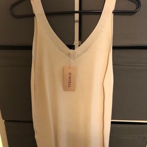 Never worn sleeveless summer tour cream coloured